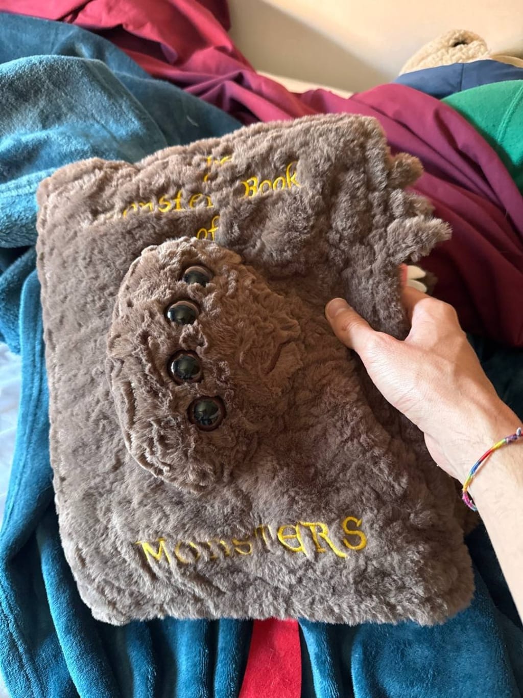 Magic Book Pillow shown in a home setting
