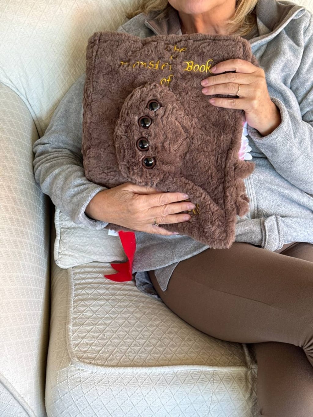 Magic Book Pillow on a sofa